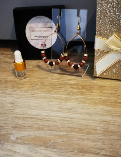 boucles d'oreilles doré ovale en acier inoxydable et de soleil et perle de lave marron 6mm