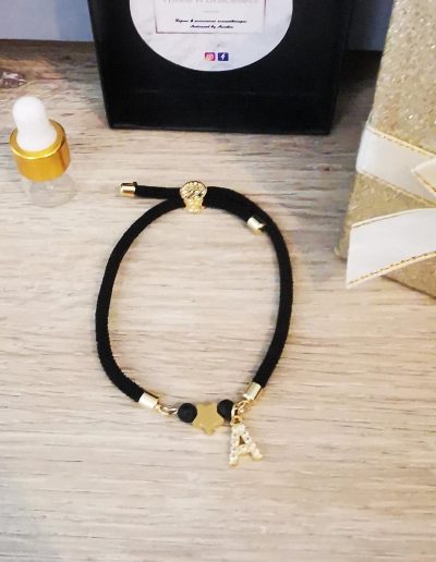 bracelet cordon noir et étoile en acier inoxydable
