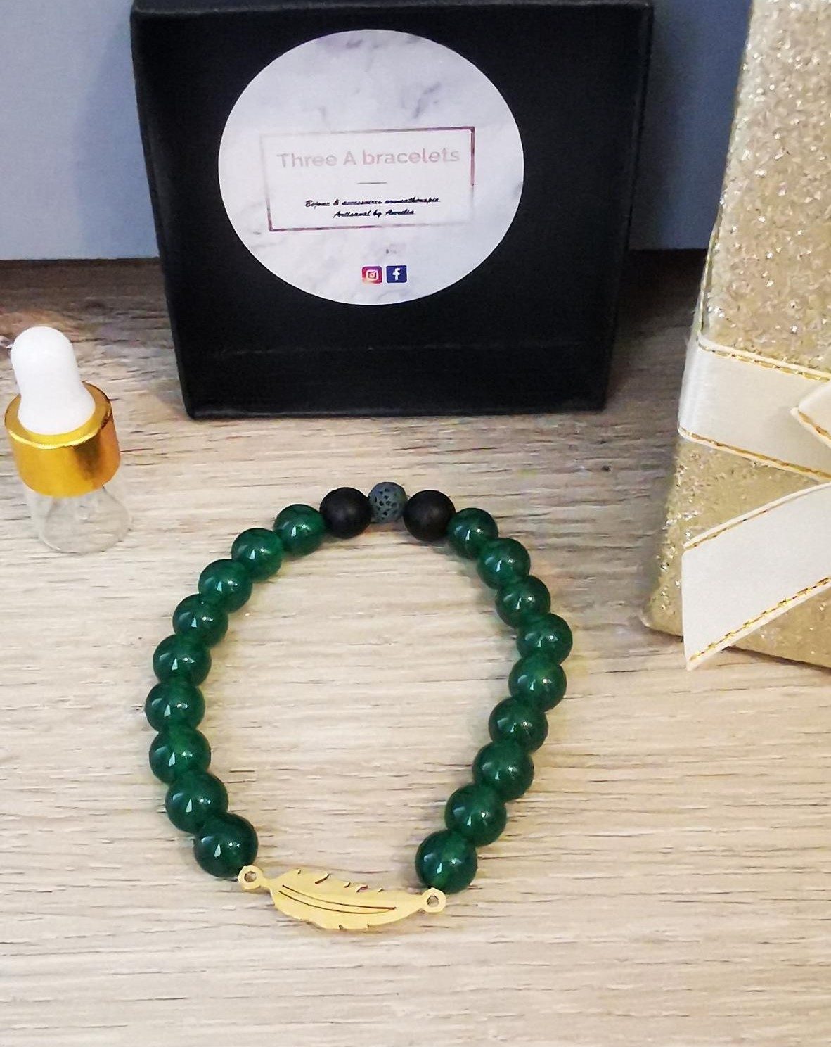 bracelet élastique perle aventurine et plume doré en acier inoxydable