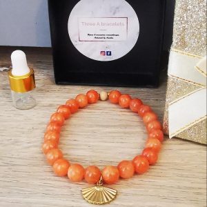bracelet élastique perle jade orange et un eventail doré en acier inoxydable