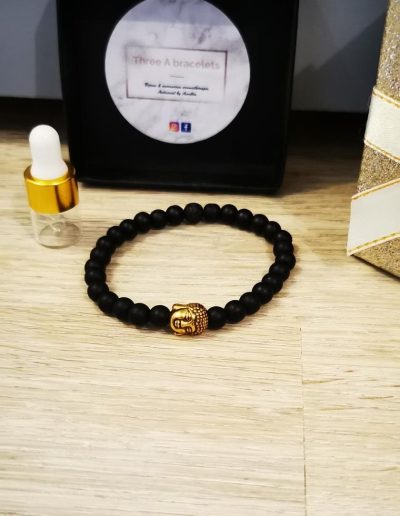 bracelet élastique perles en verre noire mâte et un buddha doré en acier inoxydable 6mm