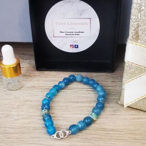 bracelet élastique perles lake blue et menotte argenté en acier inoxydable en acier inoxydable