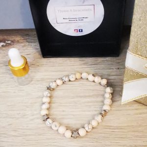 bracelet élastique perles marbre rose et gris et etoile argenté en acier inoxydable