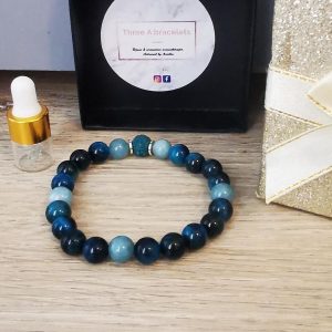 bracelet élastique perles oeil de dragon et perles aquamarine