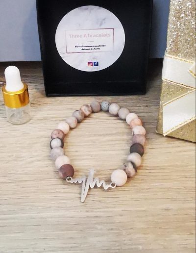 bracelet élastique perles rose et grise mâte et rythme cardiaque en acier inoxydablejpg