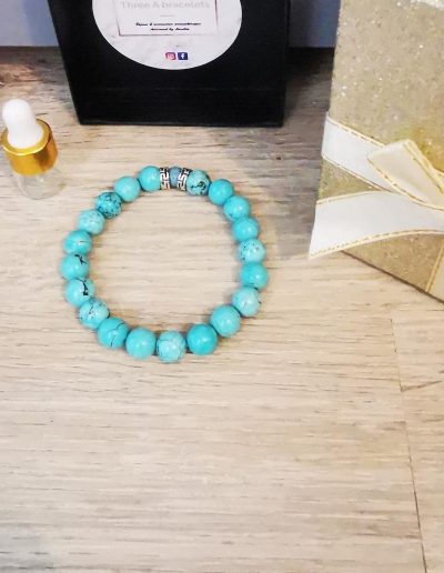 bracelet élastique perles turqoise et séparateur chinois argenté