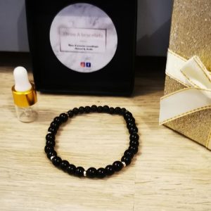 bracelet perles de verre noire brillante et séparateur en acier inoxydable et perles de lave