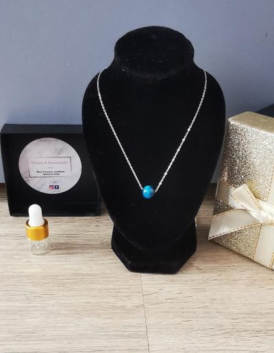 collier en acier inoxydable argenté et perle oeil de dragon