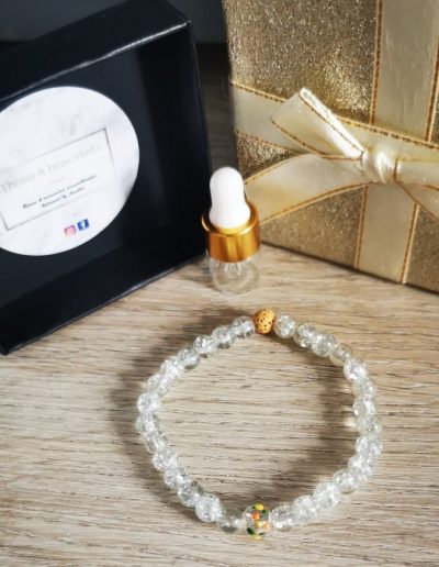 bracelet en verre craquelé une perle en verre multicouleur et une perle de lave jaune